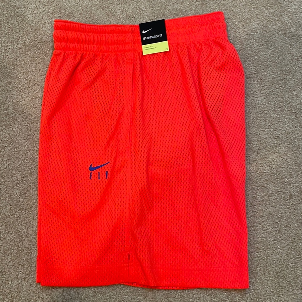 NWT Nike Dry-Fit technology women’s shorts. Size M.